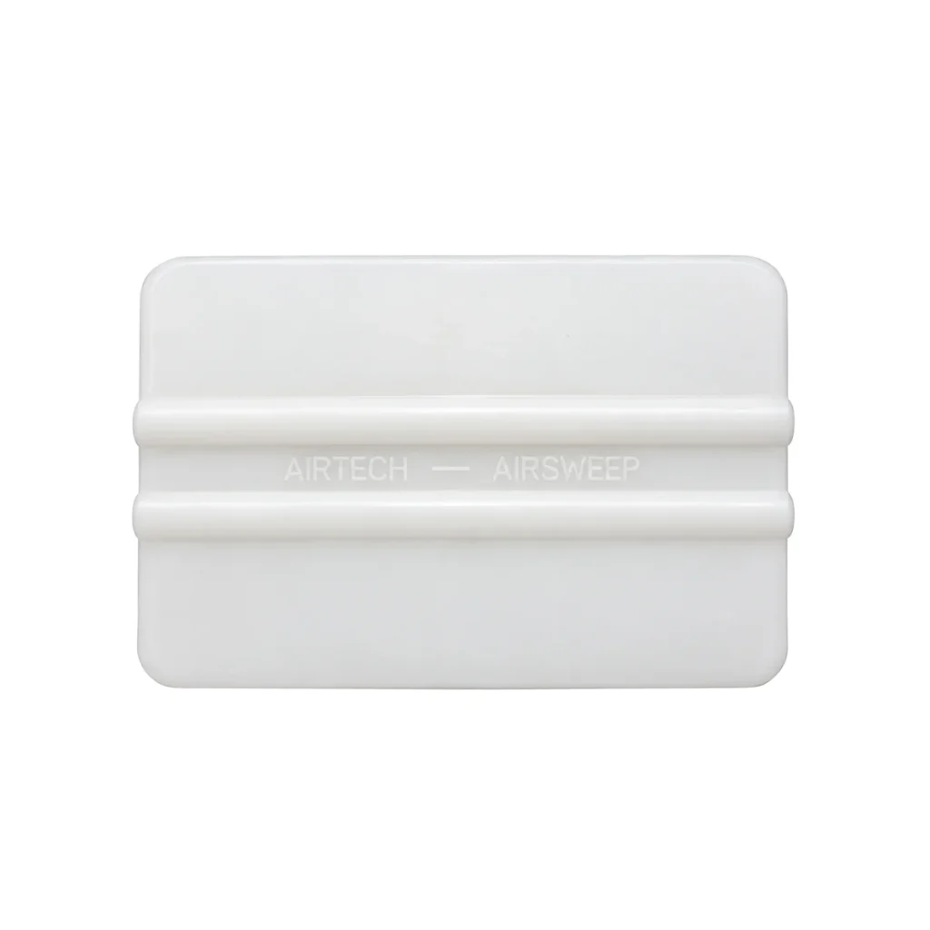 Espátula AIRSWEEP AIRTECH de HDPE blanco para compactar prepregs, eliminar aire atrapado y alisar laminados de materiales compuestos.